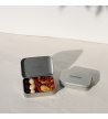 Biossom Snack Tin No. 02 – open reusable tin with chocolate-covered mango, dried mango, macadamia nuts and goji berries