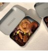 Biossom Snack Tin No. 03 – open tin with figs, apricots, pecans and pistachios beside the product packaging