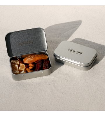 Biossom Snack Tin No. 04 – open tin with candied ginger, dates, dried bananas and almonds